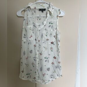 Sheer tank top great for going into the office with something under it